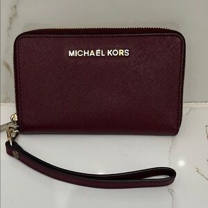 Michael Kors Dark Red Wristlet with Gold Accents
